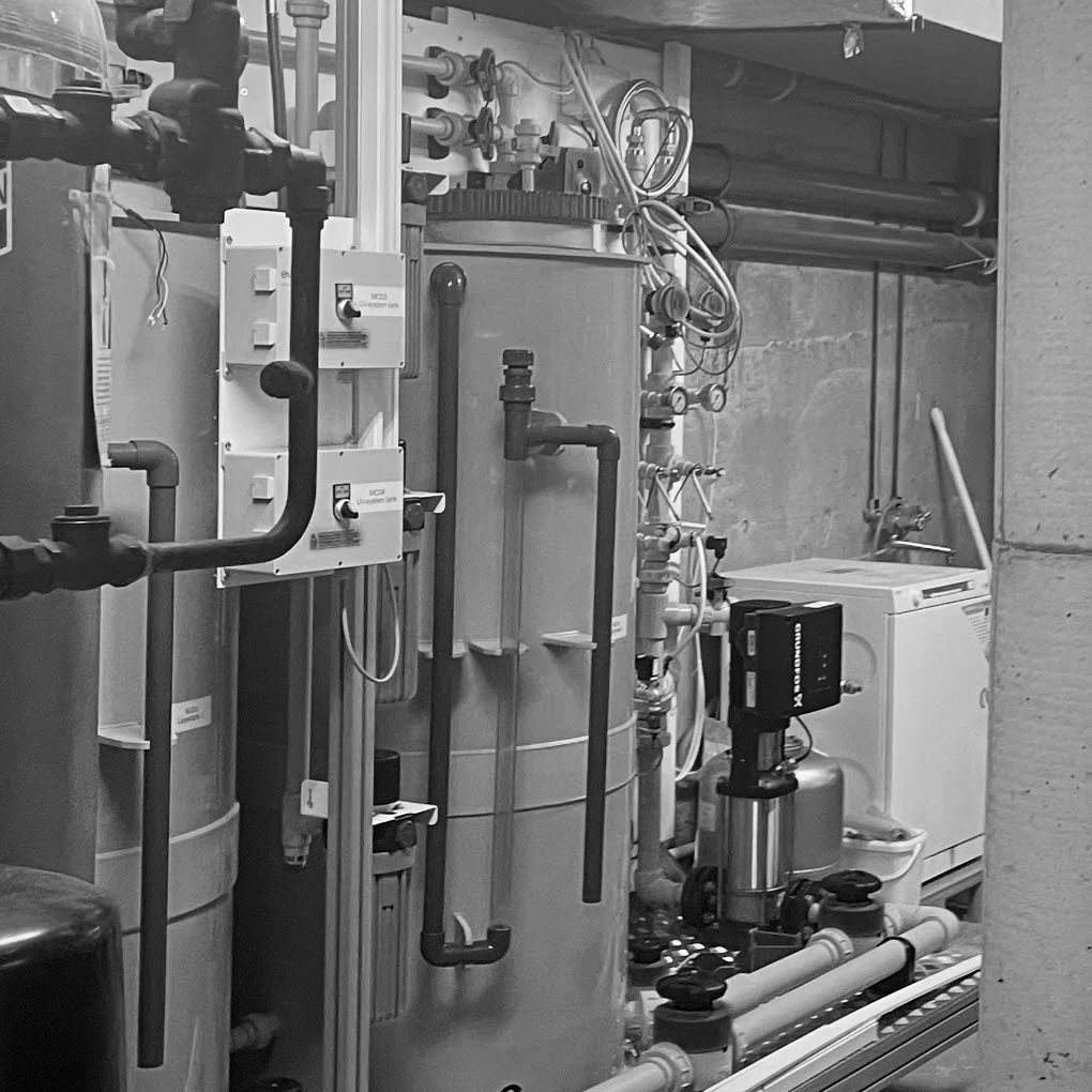 Construction of a water processing hut by a river